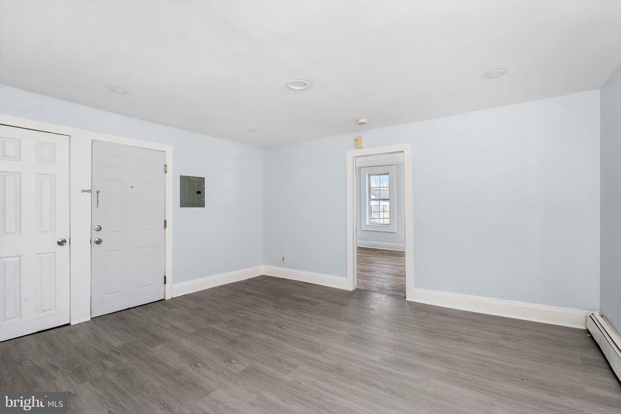 10 Lytle Street, Unit 3 Princeton, NJ 08542 - Photo 8 of 17 a view of an empty room with wooden floor and closet