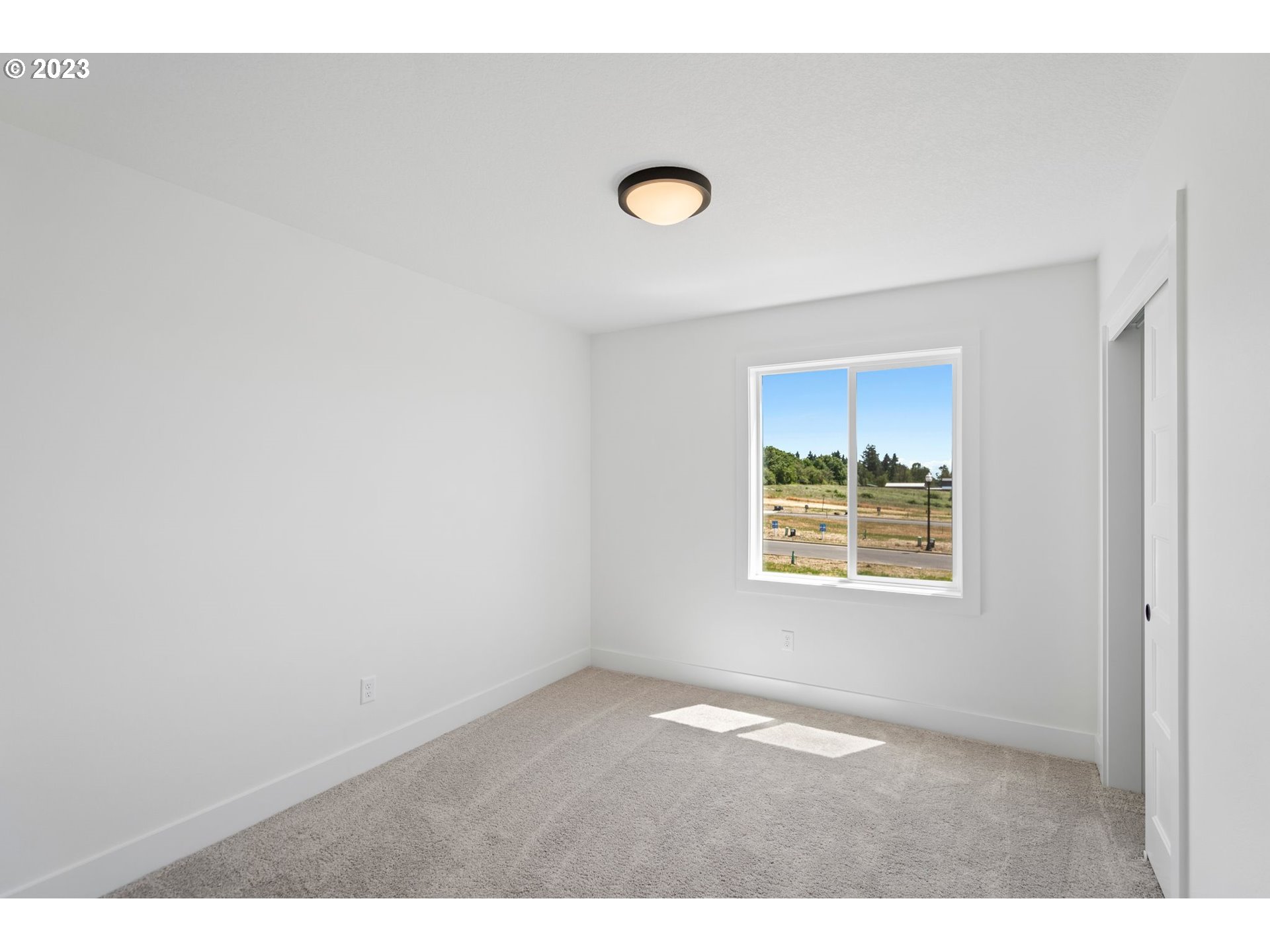 715 Northwest 175th Way Ridgefield, WA 98642 - Photo 14 of 26 a view of an empty room with a window