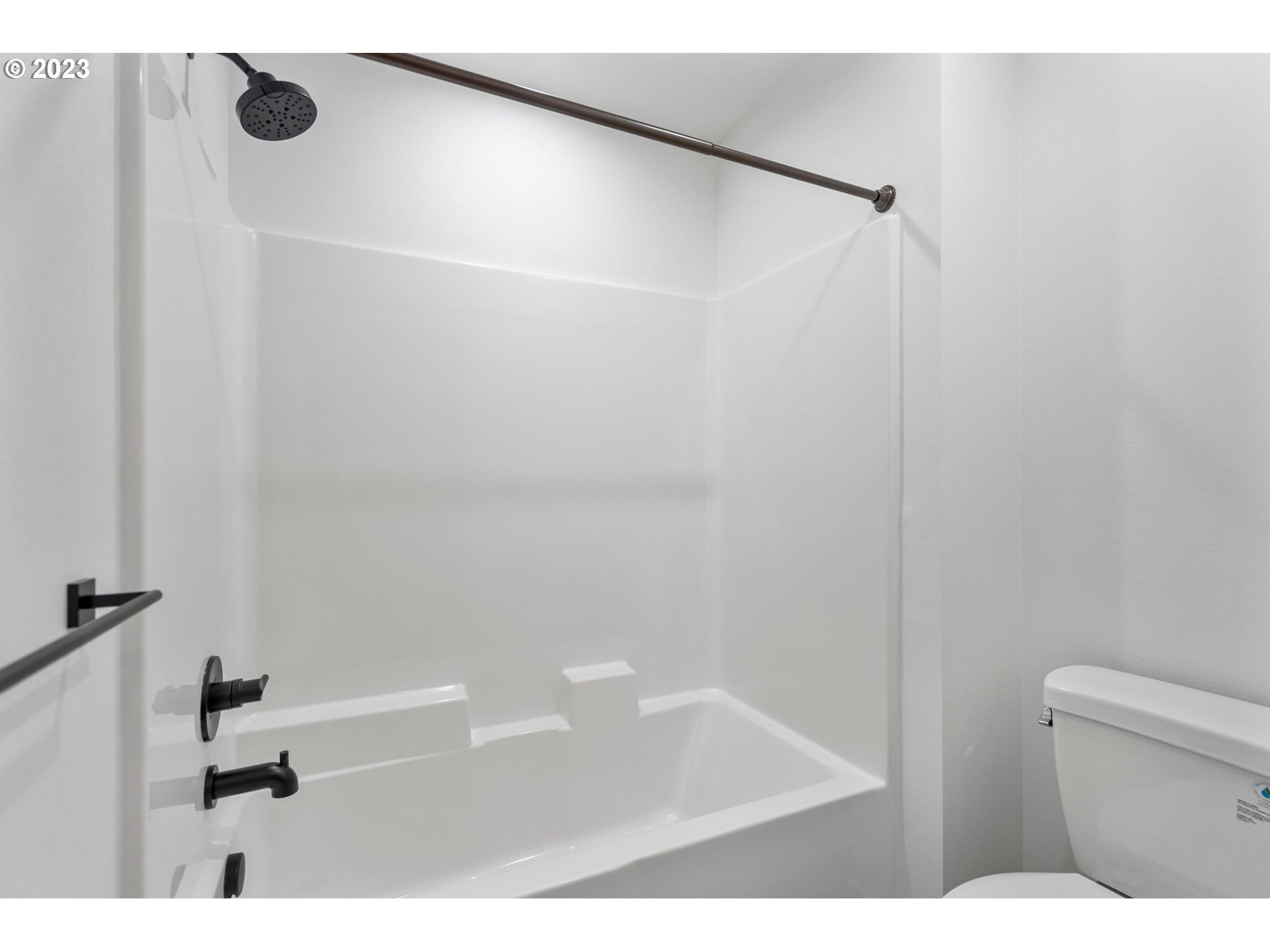 715 Northwest 175th Way Ridgefield, WA 98642 - Photo 17 of 26 a bathroom with a shower and a toilet