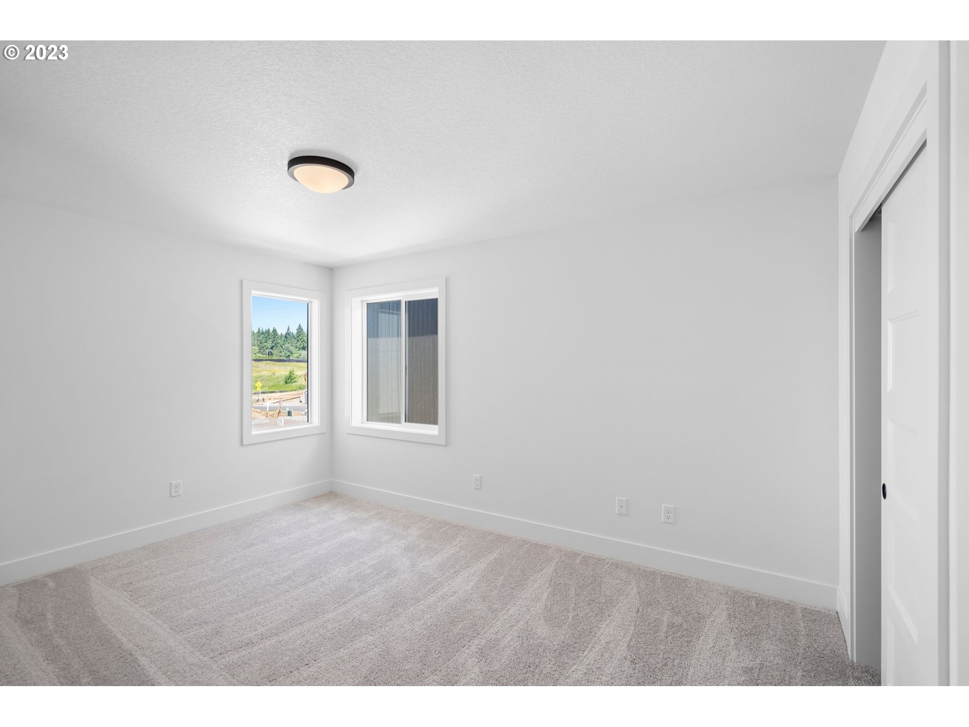 715 Northwest 175th Way Ridgefield, WA 98642 - Photo 19 of 26 a view of an empty room with a window
