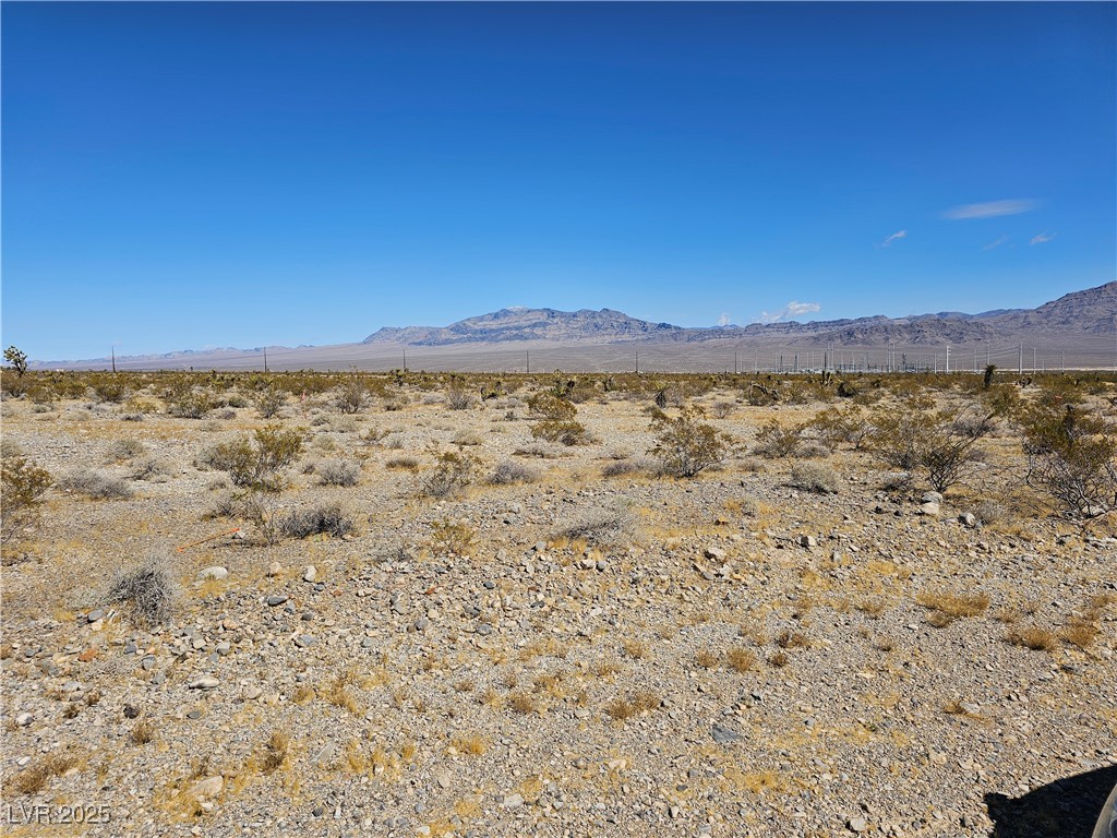 Log Cabin Las Vegas, NV 89166 - Photo 2 of 2 View of mountain backdrop with rural landscape and