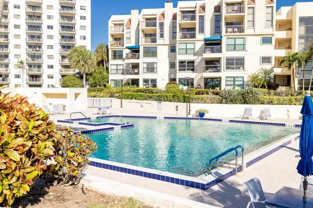 a view of a building with a yard