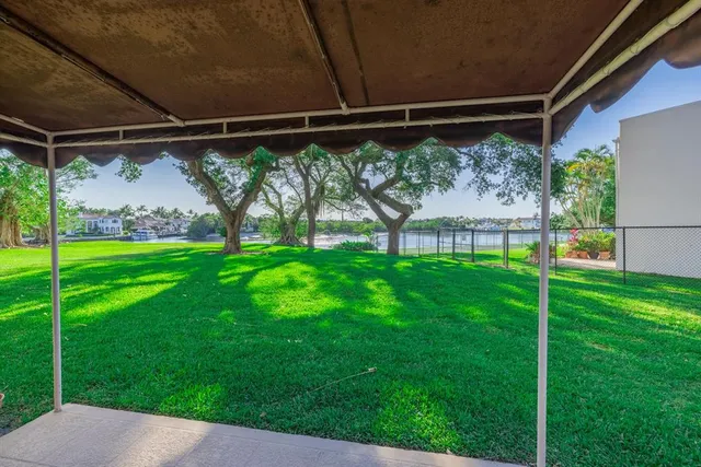 a view of a building with a yard