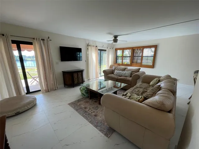 a bathroom with a toilet and a mirror