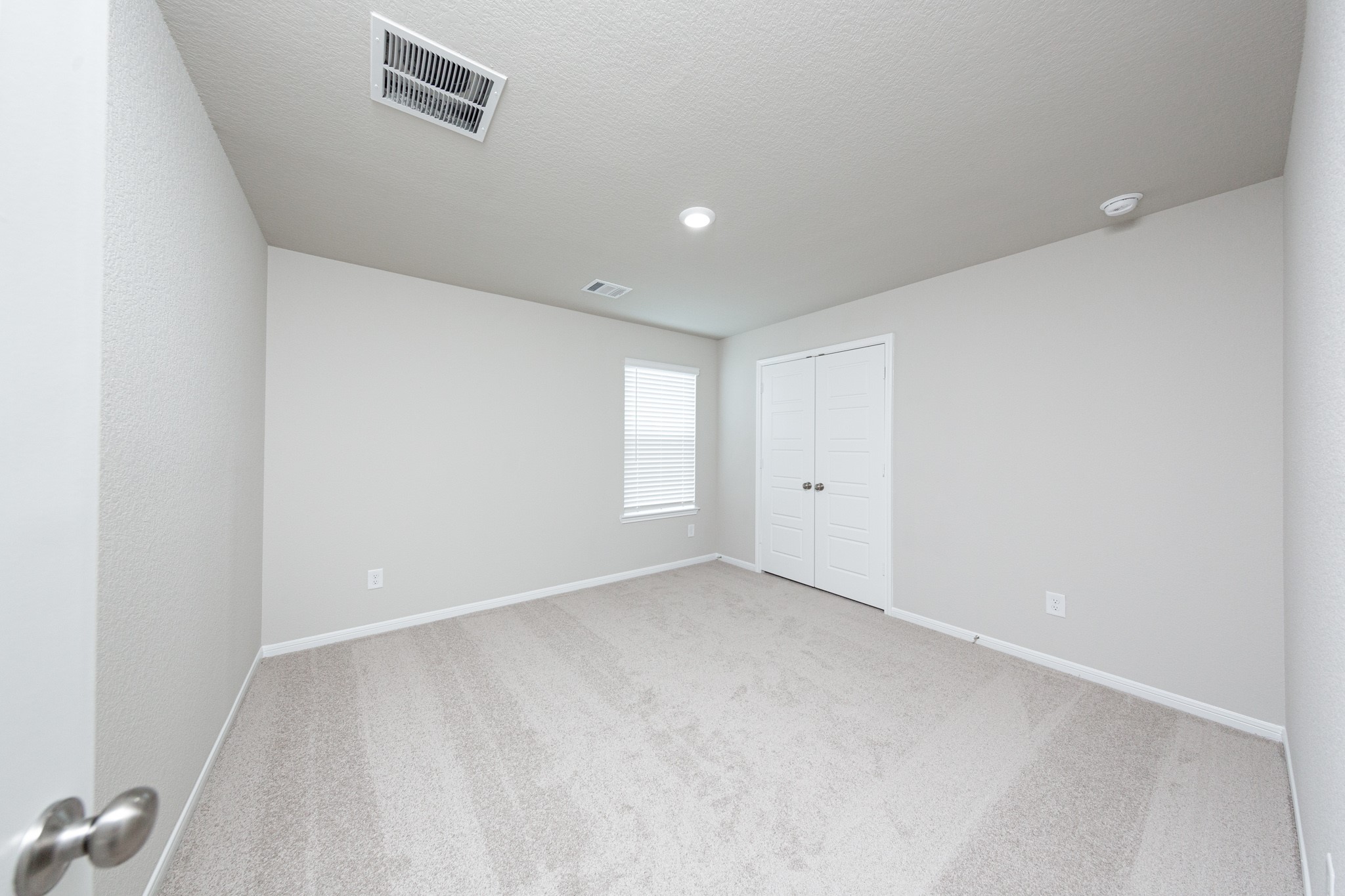 3878 Avalon Lane Conroe, TX 77301 - Photo 18 of 28 a view of an empty room with a window
