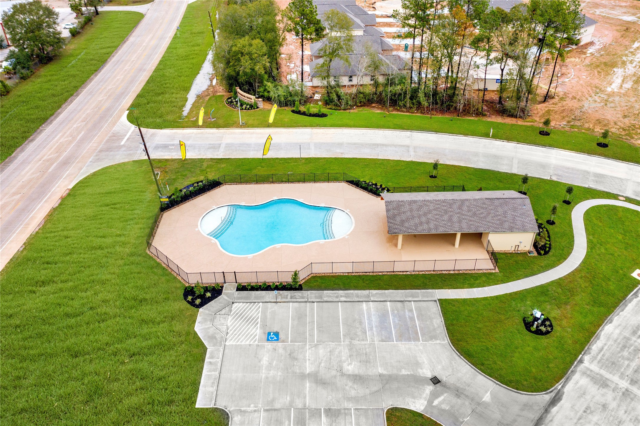 3878 Avalon Lane Conroe, TX 77301 - Photo 26 of 28 a view of swimming pool with a garden and plants