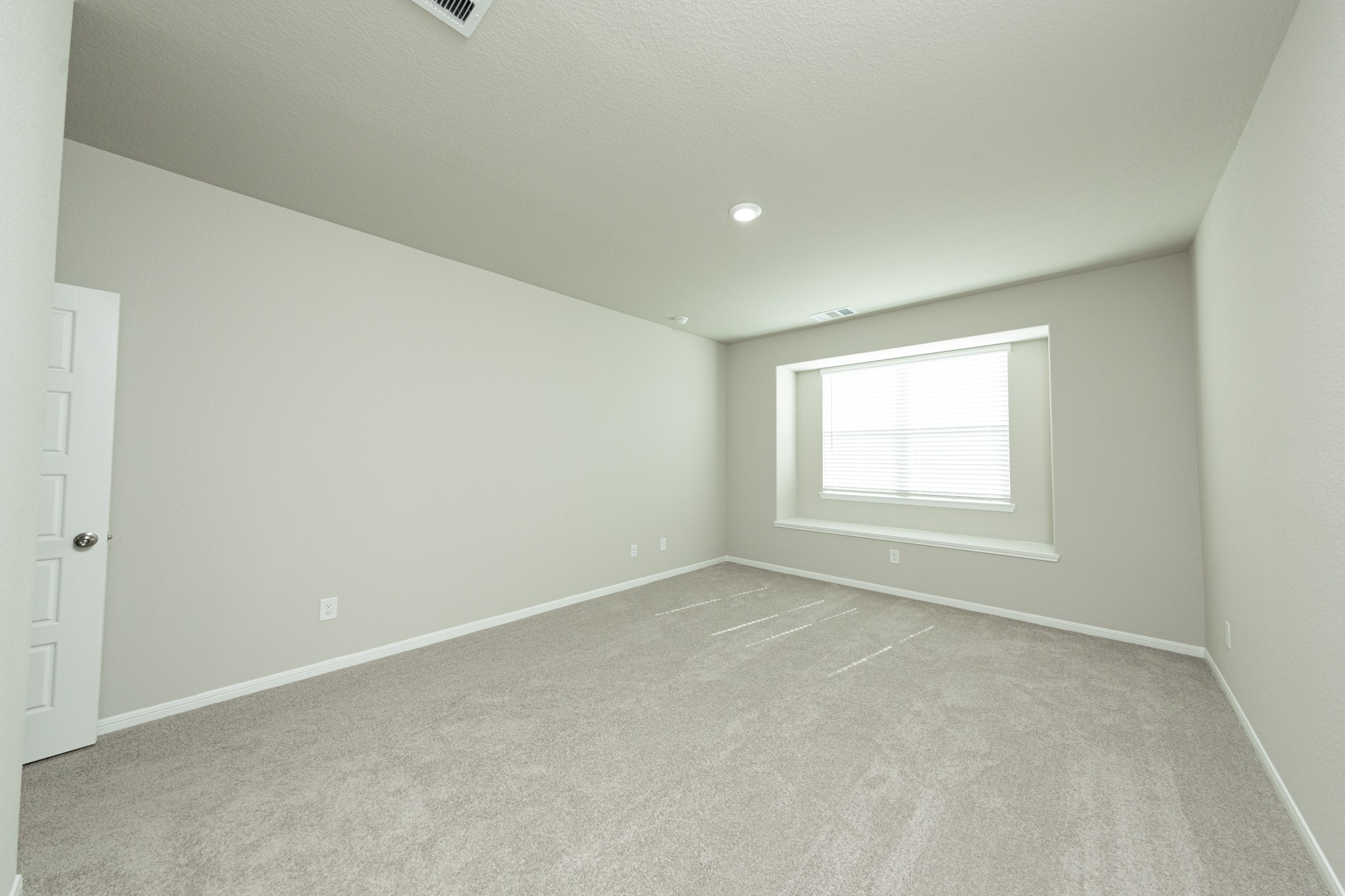 3878 Avalon Lane Conroe, TX 77301 - Photo 9 of 28 an empty room with a window