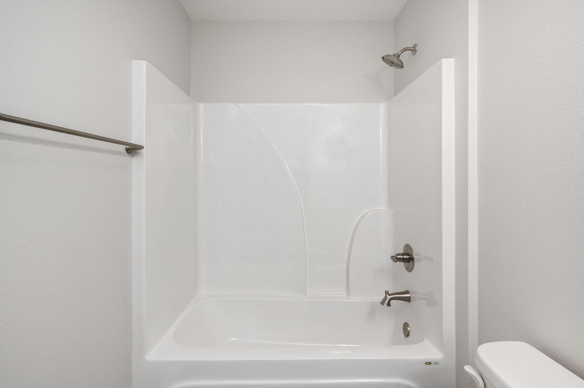 1002 Valley Road Crestview, FL 32539 - Photo 19 of 31 a bathroom with a bathtub and a shower