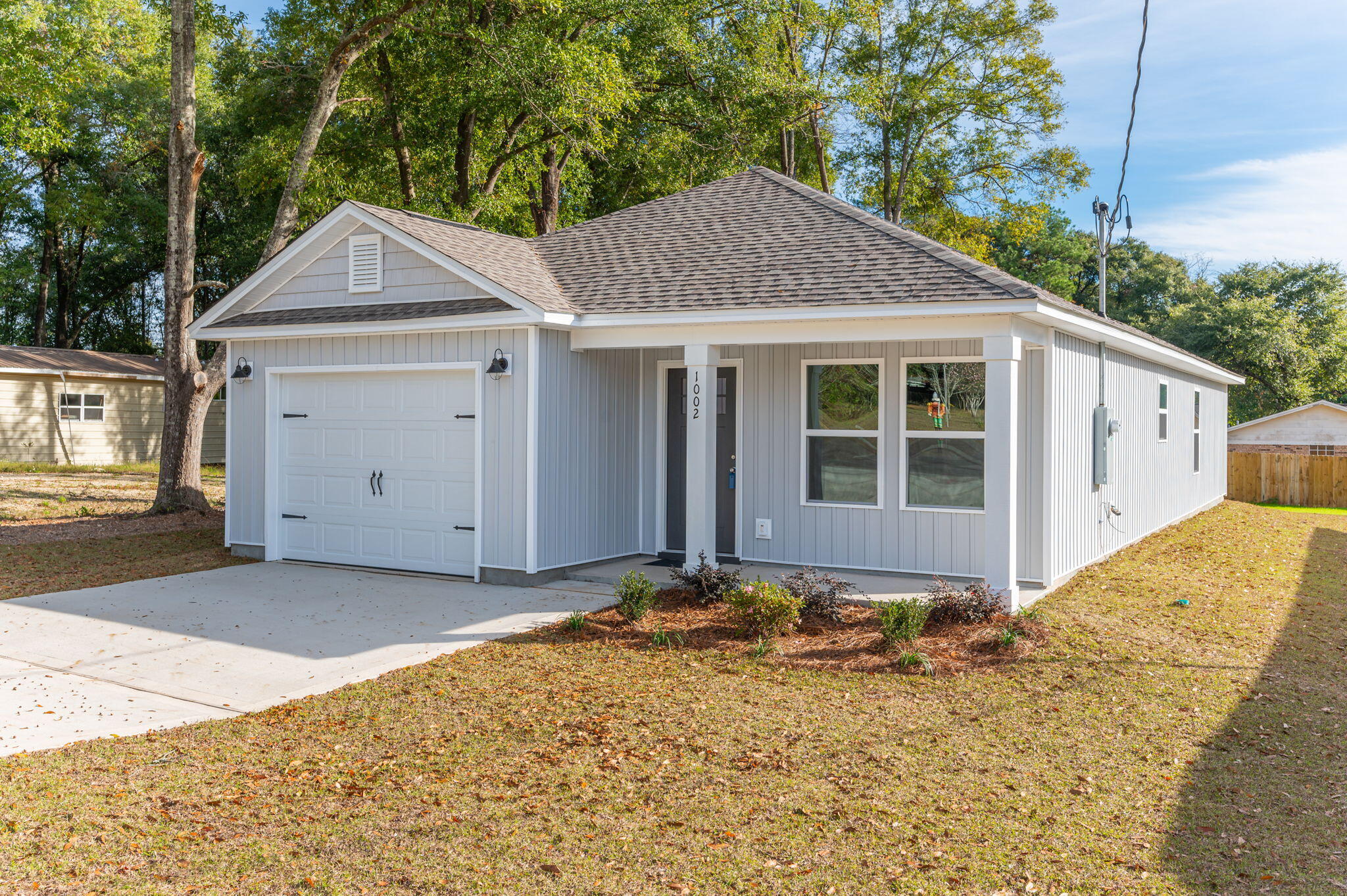 1002 Valley Road Crestview, FL 32539 - Photo 2 of 31 a front view of a house with a yard