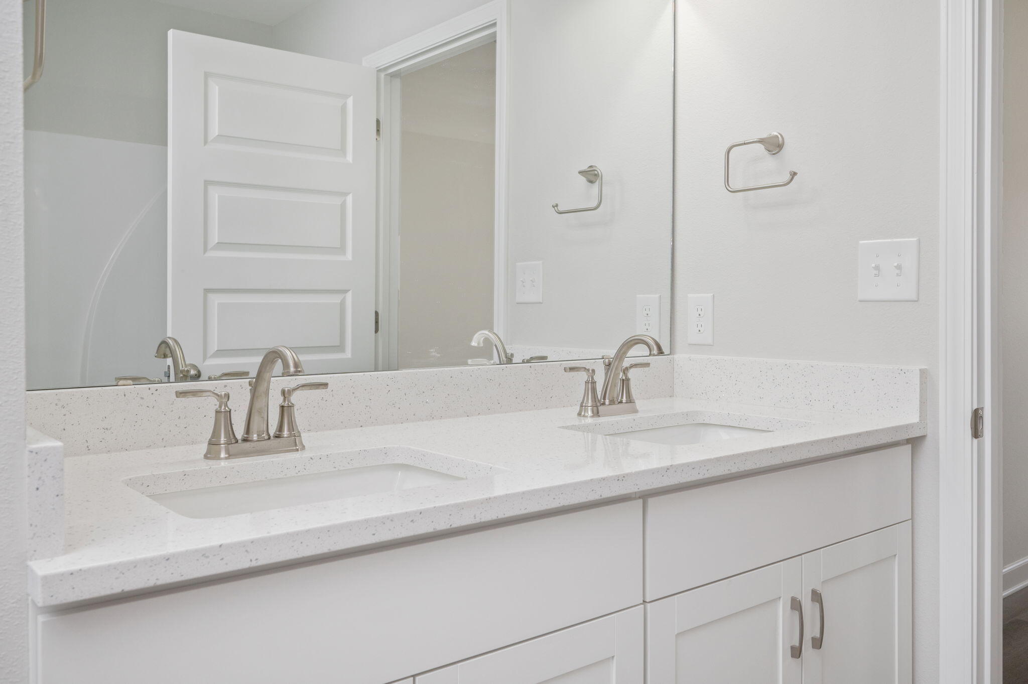1002 Valley Road Crestview, FL 32539 - Photo 23 of 31 a bathroom with a sink and a mirror