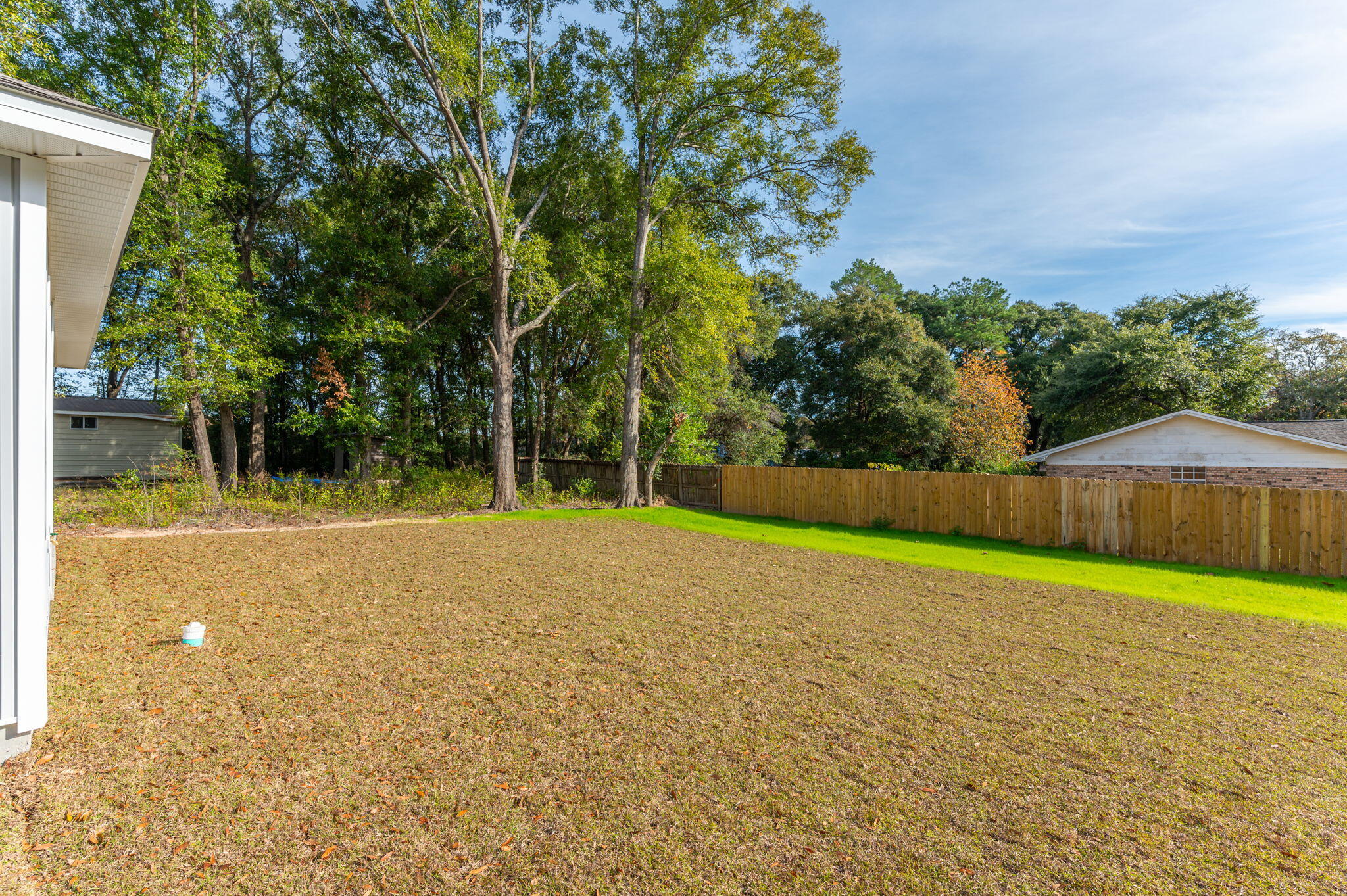 1002 Valley Road Crestview, FL 32539 - Photo 27 of 31 a view of a yard with palm trees