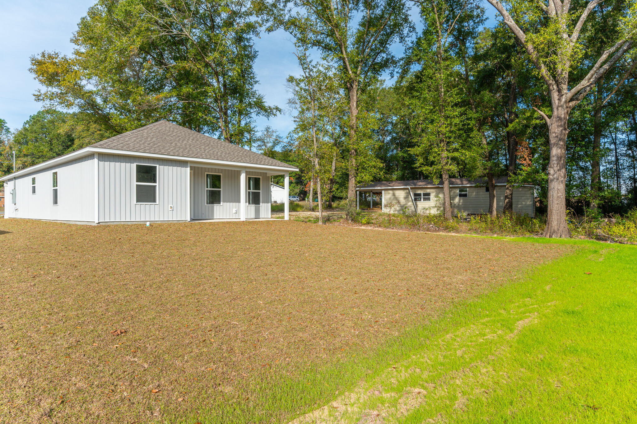 1002 Valley Road Crestview, FL 32539 - Photo 28 of 31 a view of a house with yard and sitting area