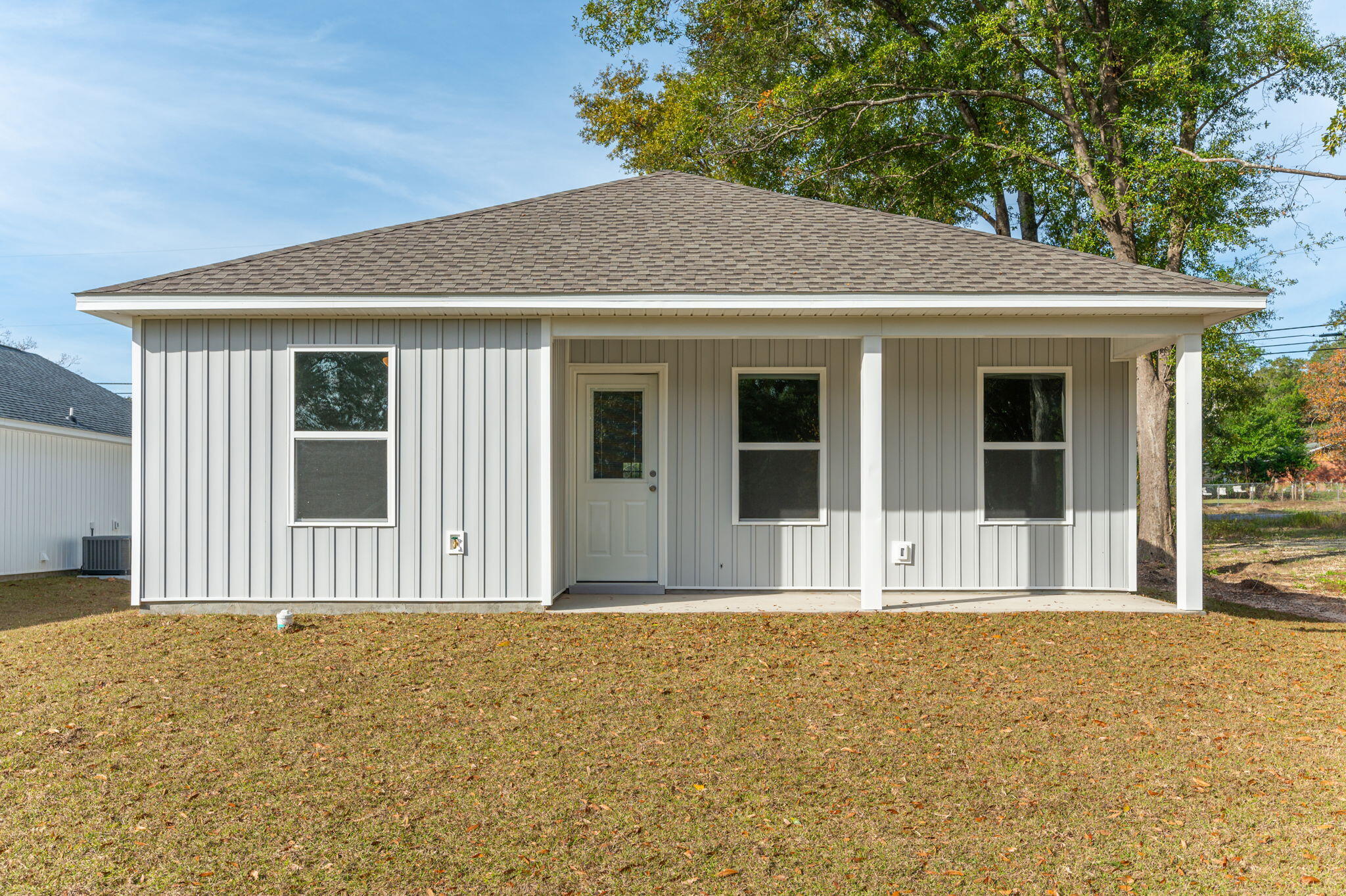 1002 Valley Road Crestview, FL 32539 - Photo 29 of 31 a front view of a house with large windows