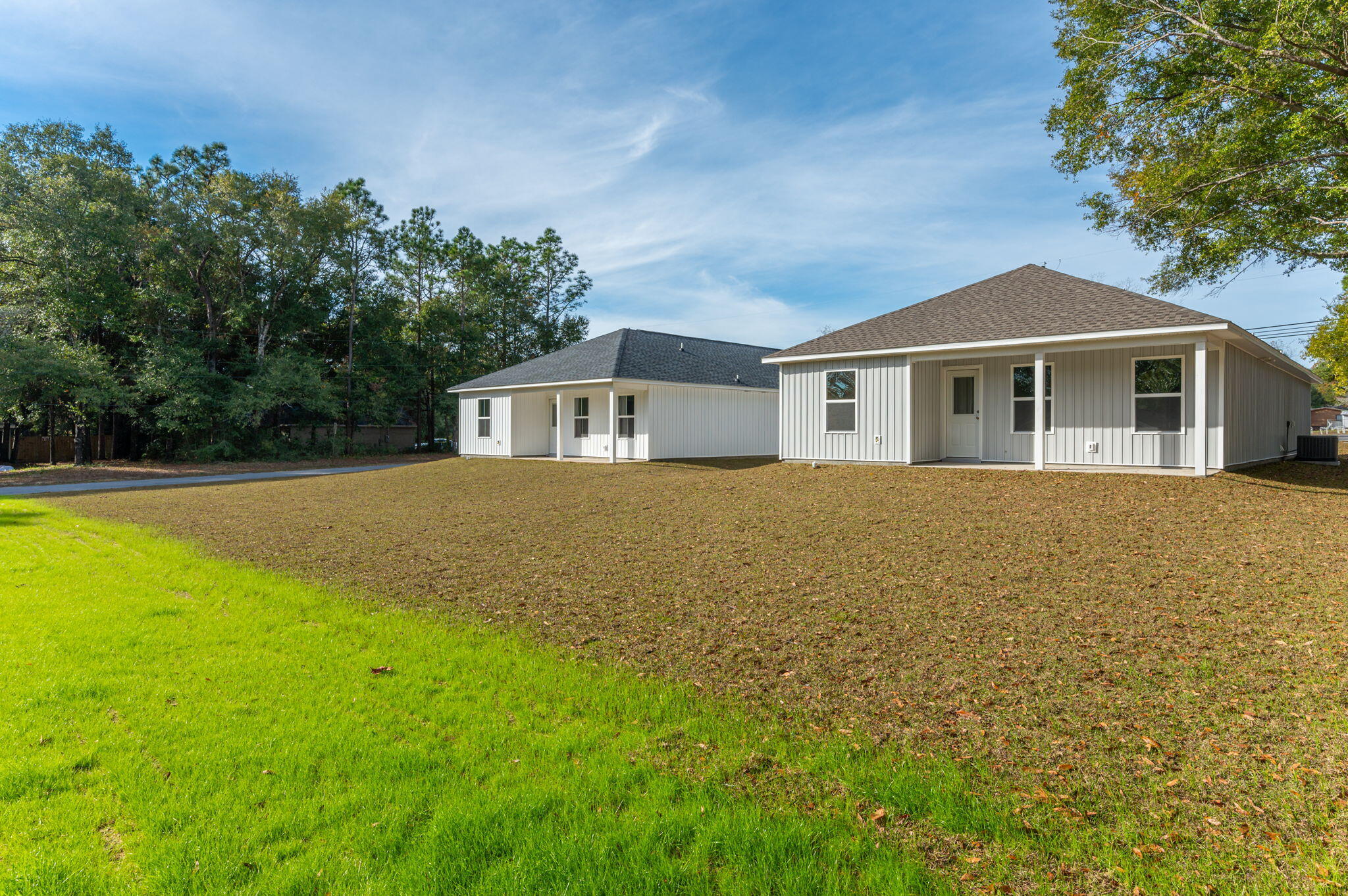1002 Valley Road Crestview, FL 32539 - Photo 30 of 31 a front view of a house with yard and trees