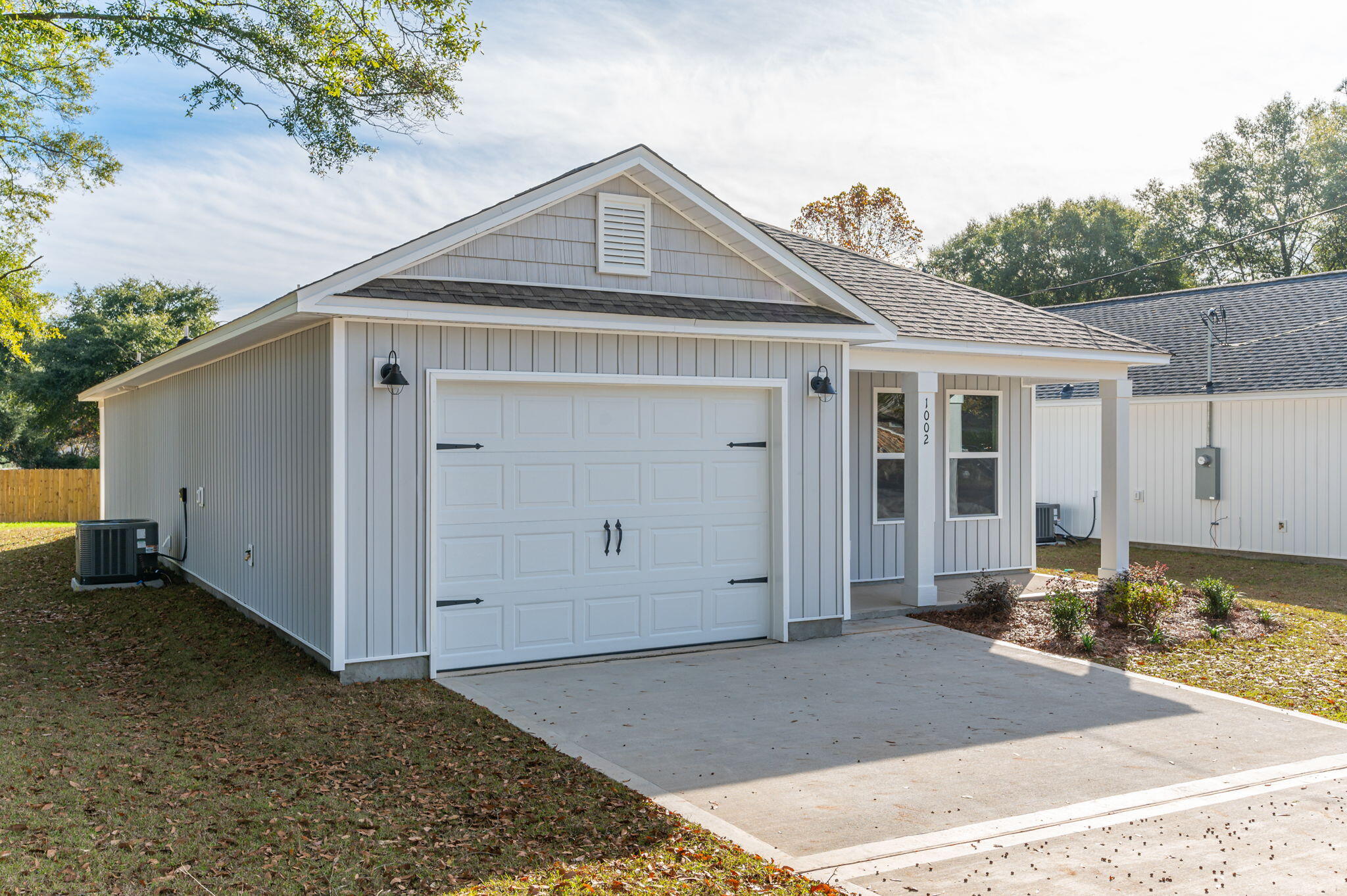 1002 Valley Road Crestview, FL 32539 - Photo 3 of 31 a front view of a house with a yard