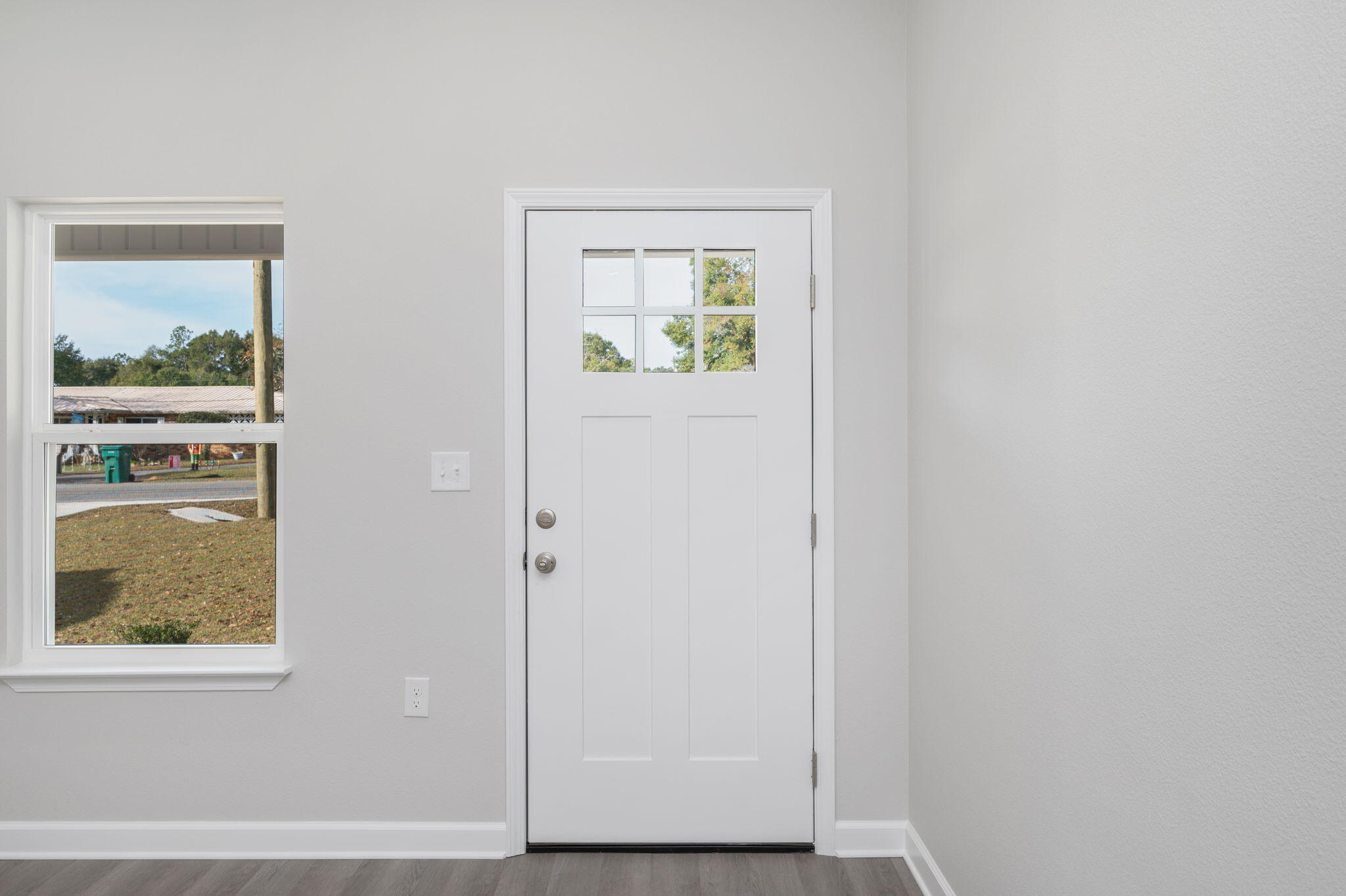 1002 Valley Road Crestview, FL 32539 - Photo 5 of 31 a view of an entryway with wooden floor