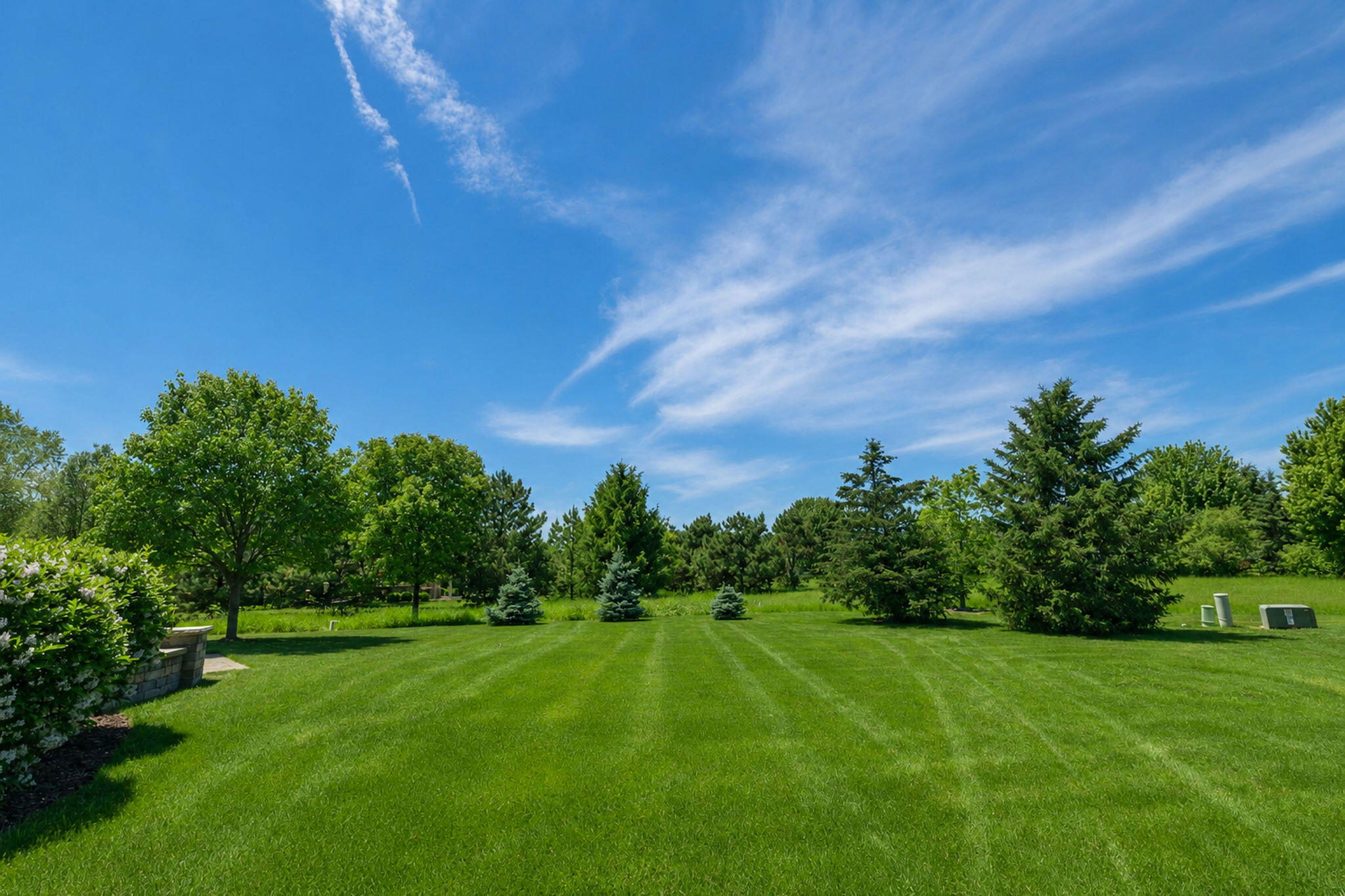 1260 4 Winds Way Hartland, WI 53029 - Photo 9 of 79 Expansive Backyard