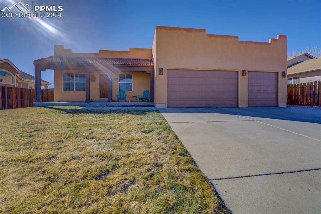111 Rocchio Drive Florence, CO 81226 - Photo 1 of 50 a view of a house with a yard