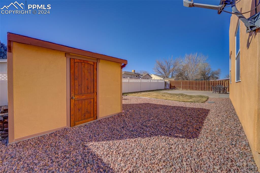 111 Rocchio Drive Florence, CO 81226 - Photo 12 of 50 a view of empty room with a yard