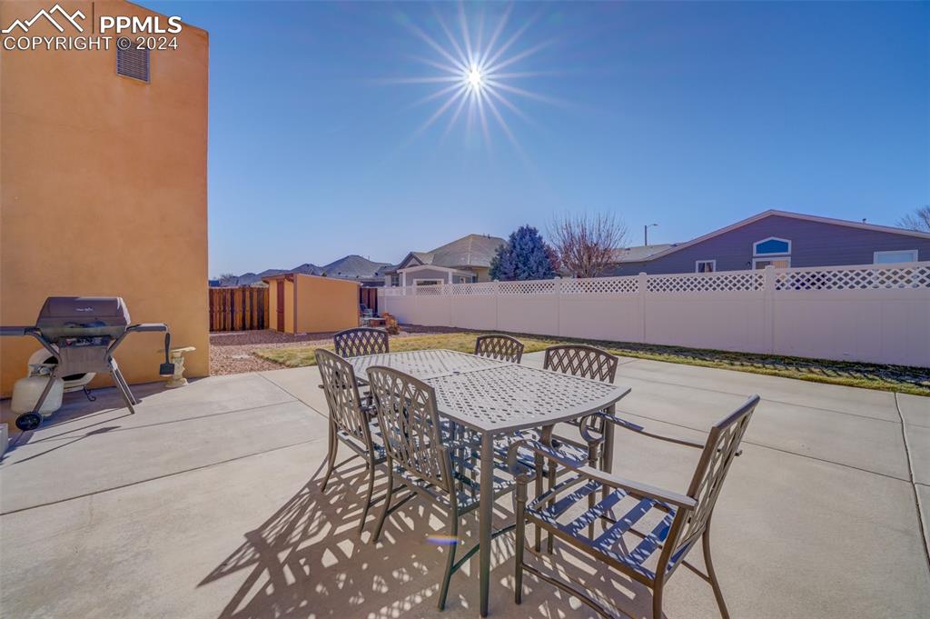 111 Rocchio Drive Florence, CO 81226 - Photo 13 of 50 a view of a patio with a table and chairs