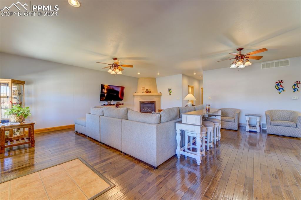 111 Rocchio Drive Florence, CO 81226 - Photo 14 of 50 a living room with furniture and a wooden floor