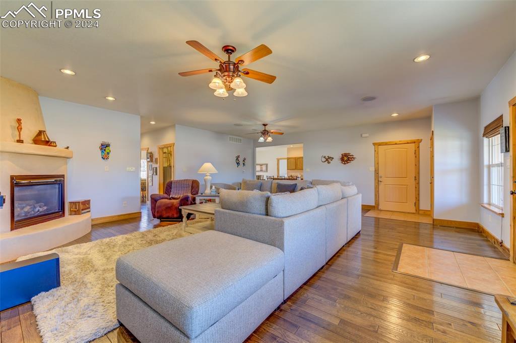 111 Rocchio Drive Florence, CO 81226 - Photo 16 of 50 a living room with furniture and a fireplace