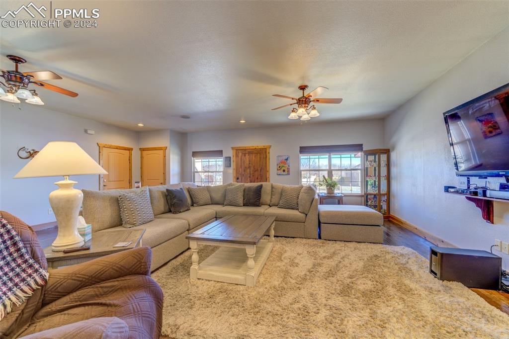 111 Rocchio Drive Florence, CO 81226 - Photo 18 of 50 a living room with furniture and a chandelier