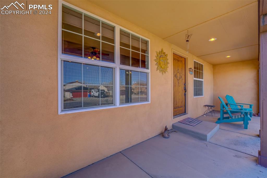 111 Rocchio Drive Florence, CO 81226 - Photo 2 of 50 a view of an chairs and table in a room