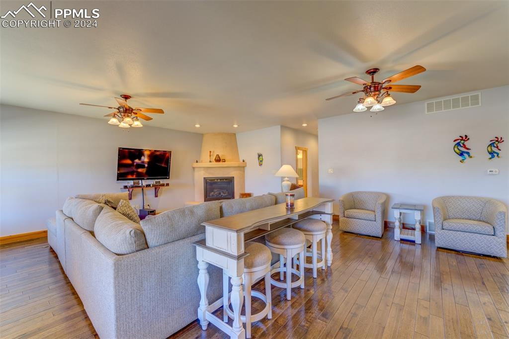 111 Rocchio Drive Florence, CO 81226 - Photo 21 of 50 a living room with furniture and wooden floor