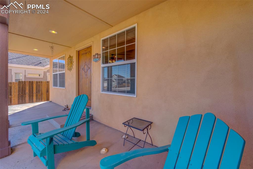 111 Rocchio Drive Florence, CO 81226 - Photo 3 of 50 a workspace with furniture and wooden floor