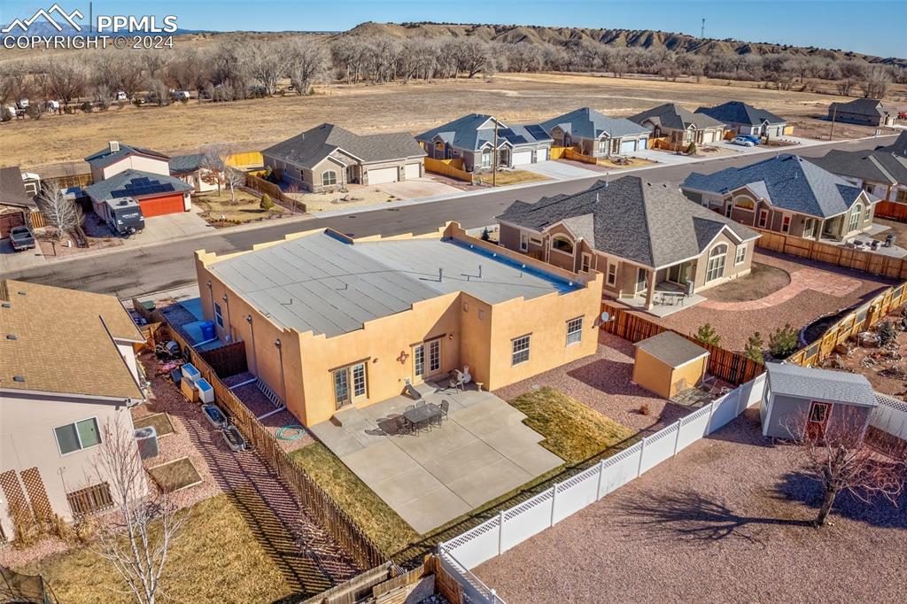 111 Rocchio Drive Florence, CO 81226 - Photo 48 of 50 an aerial view of a house with outdoor space and lake view