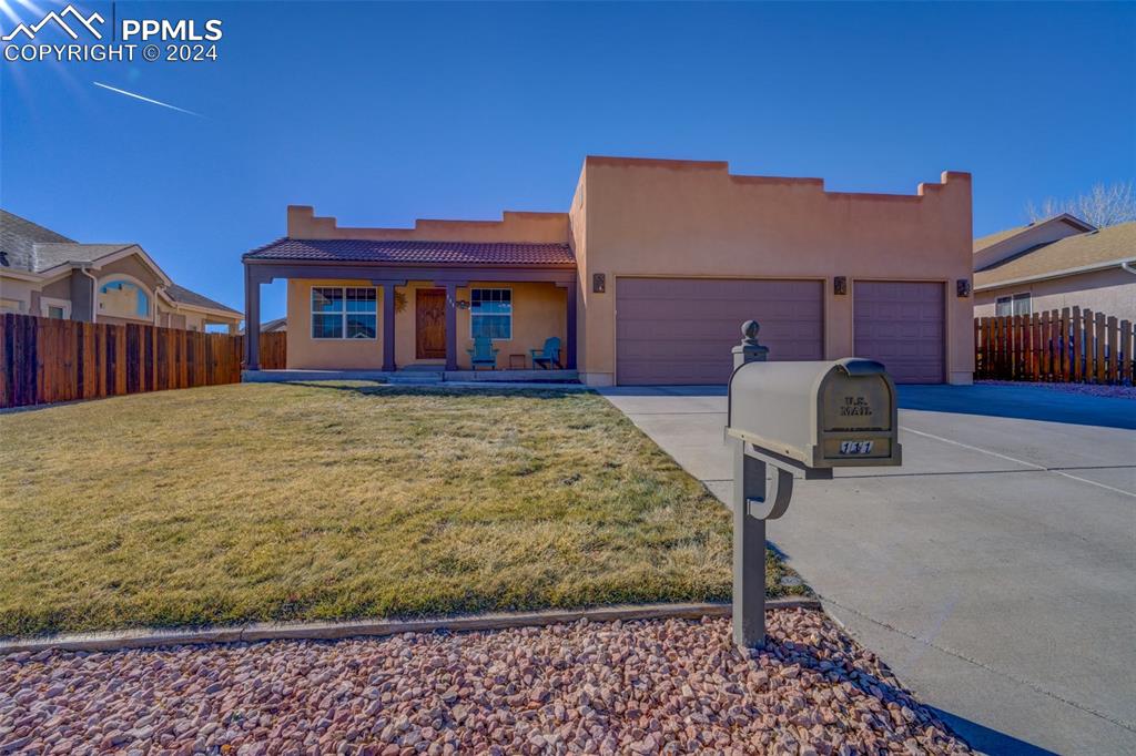 111 Rocchio Drive Florence, CO 81226 - Photo 6 of 50 a view of a house with a patio