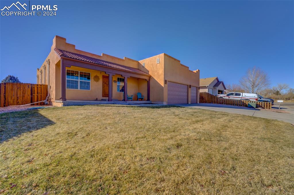 111 Rocchio Drive Florence, CO 81226 - Photo 7 of 50 a view of front of house with car parked