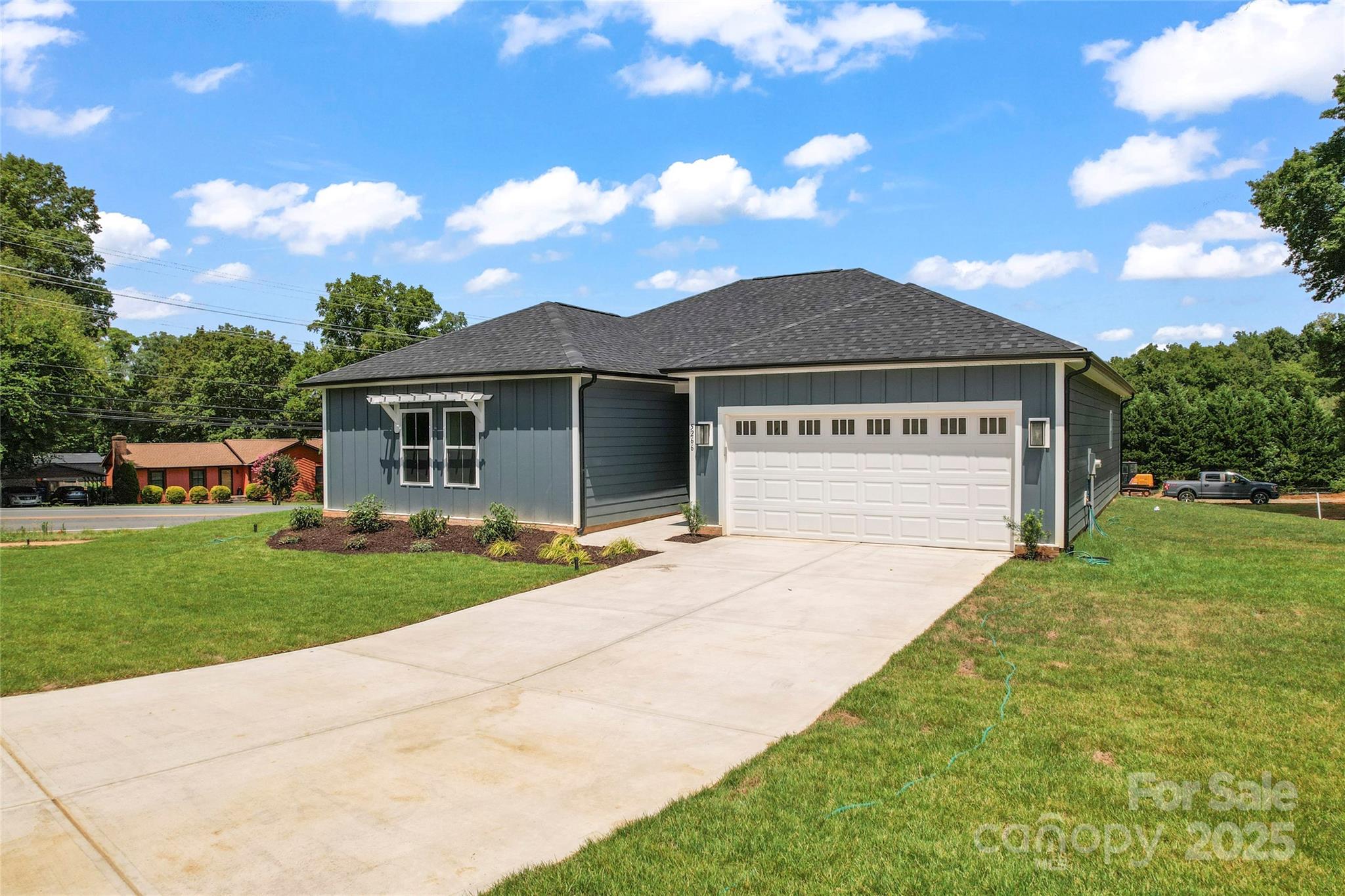 1 Morehead Road Harrisburg, NC 28075 - Photo 29 of 32 a view of a house with a yard