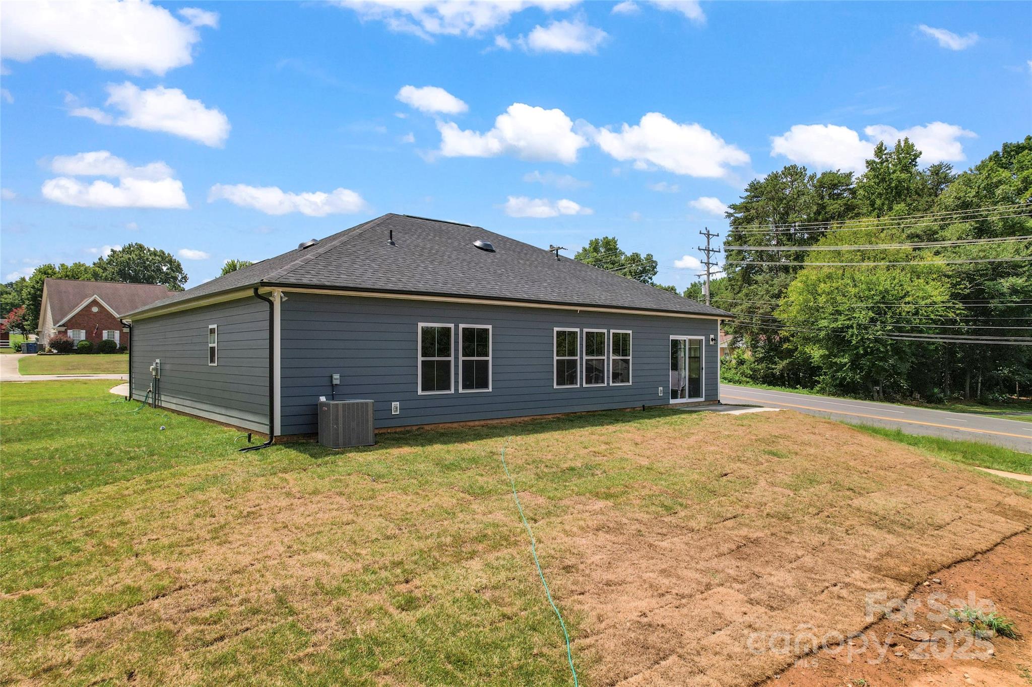 1 Morehead Road Harrisburg, NC 28075 - Photo 31 of 32 a front view of a house with yard