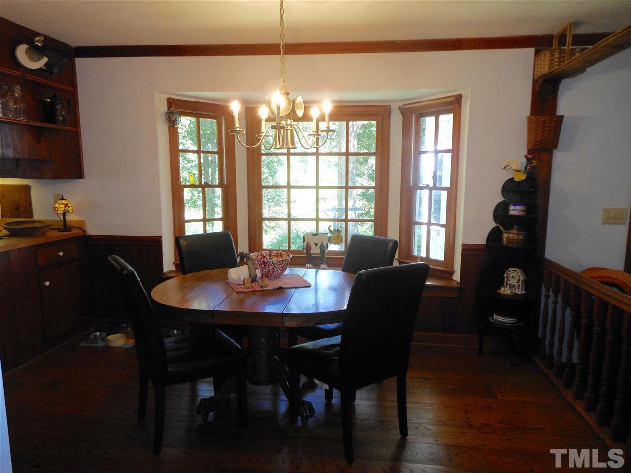800 Mudham Road Wendell, NC 27591 - Photo 5 of 25 The breakfast area looking back into the kitchen has wonderful window seat. Imagine bird watching and looking out at the pond!