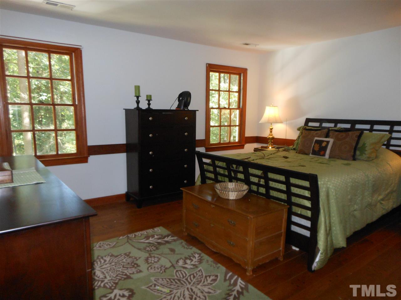 800 Mudham Road Wendell, NC 27591 - Photo 7 of 25 Upstairs are 4 large bedrooms that look like this, all with fresh paint, ample closets and beautiful hardwood floors.