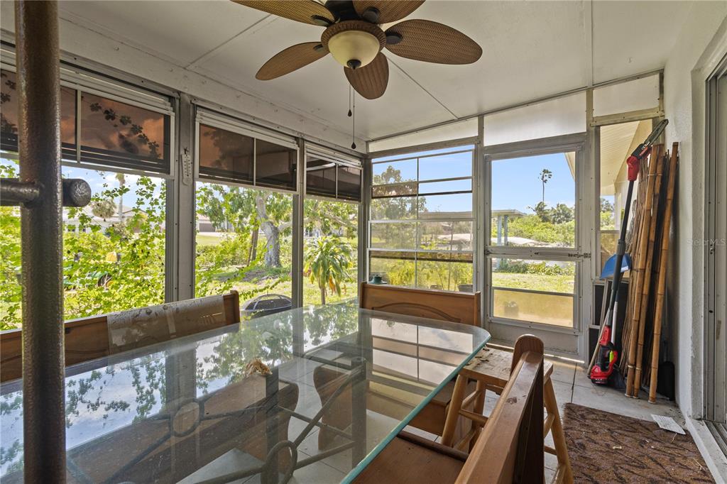 4020 Palm Drive Punta Gorda, FL 33950 - Photo 21 of 24 a view of a living room with furniture window and outside view