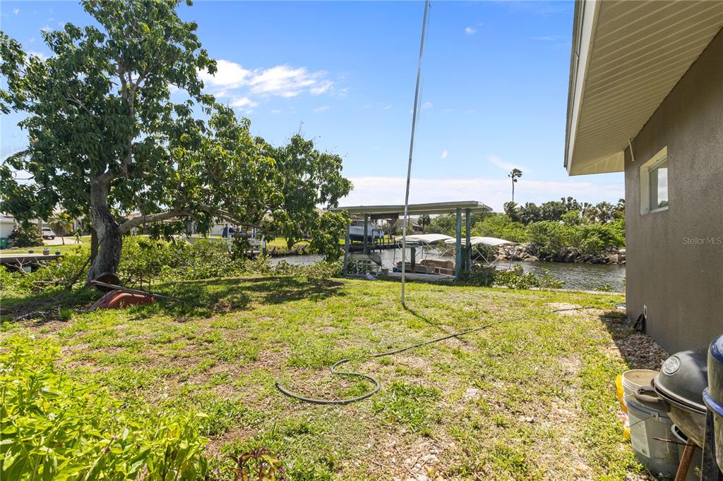 4020 Palm Drive Punta Gorda, FL 33950 - Photo 22 of 24 a swimming pool with yard and outdoor seating