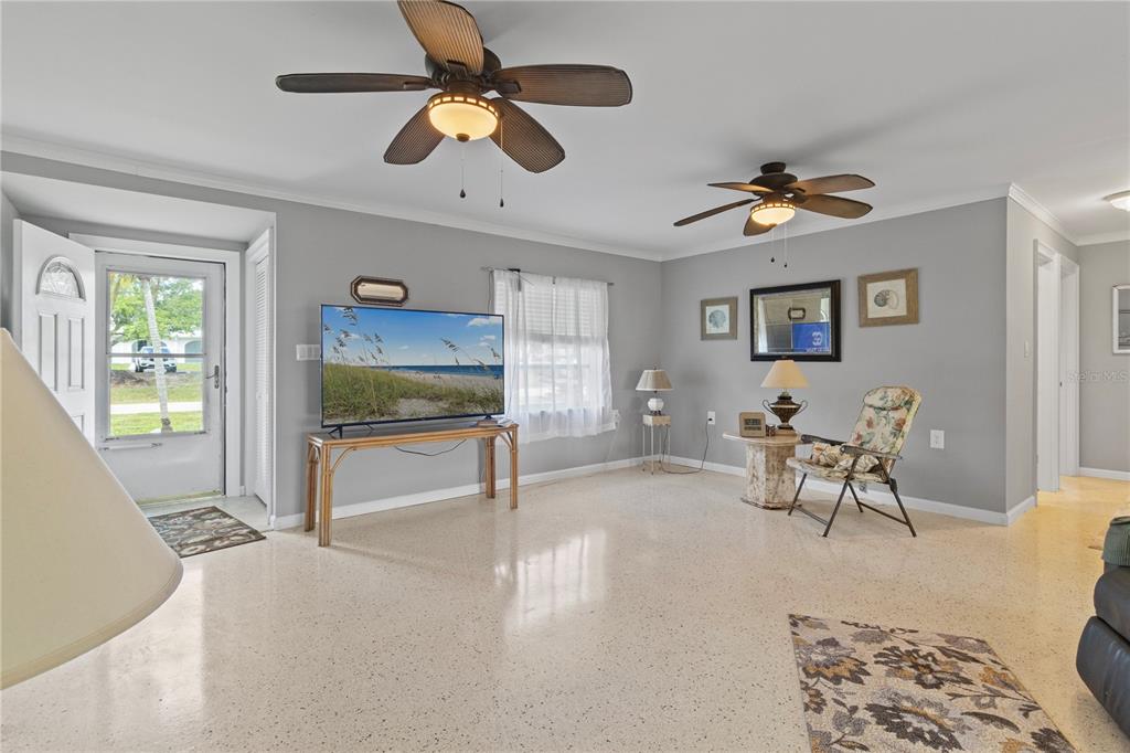 4020 Palm Drive Punta Gorda, FL 33950 - Photo 5 of 24 a living room with furniture and a flat screen tv