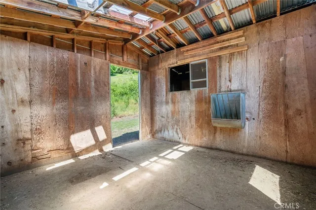 a view of balcony with furniture