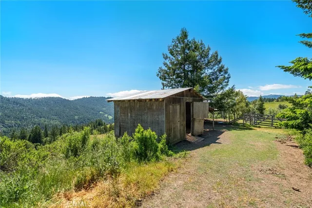 a view of a patio with wooden floor