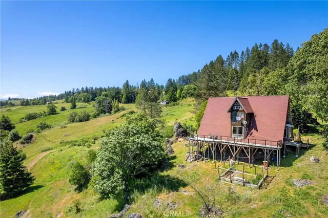 a view of a town with mountains in the background