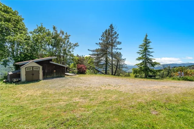 a bathroom with a sink a toilet and a window