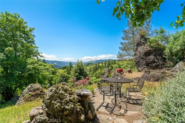 a view of backyard with green space