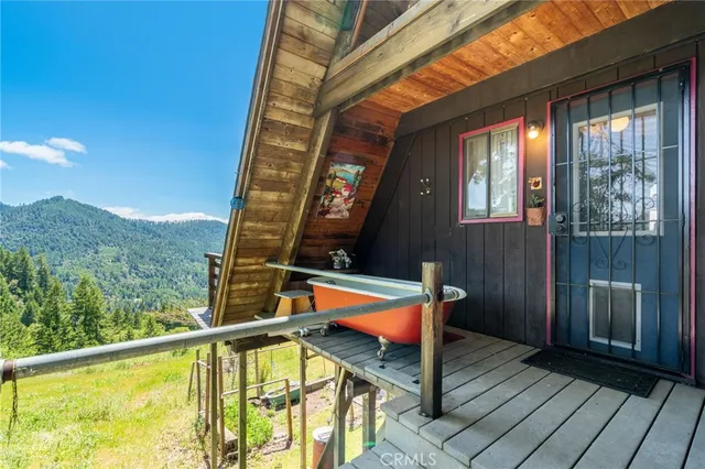 a view of a chairs and table in a patio