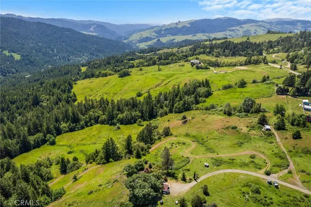 a view of a yard with an outdoor space