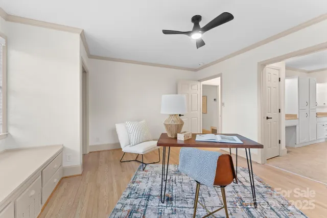 a bathroom with a granite countertop sink a mirror and a bathtub