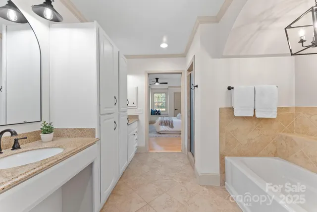 a white toilet sitting next to a bathroom sink