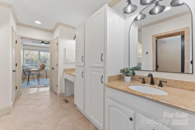 a large white bed in a white room